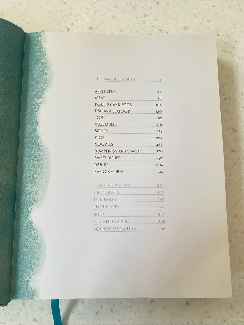 Land of Fish and Rice by Fuchsia Dunlop - Blue & Gold Hardcover Cookbook